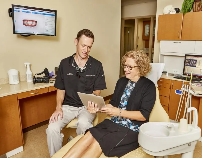 Dr. DiNinno discussing a patient's treatment with them