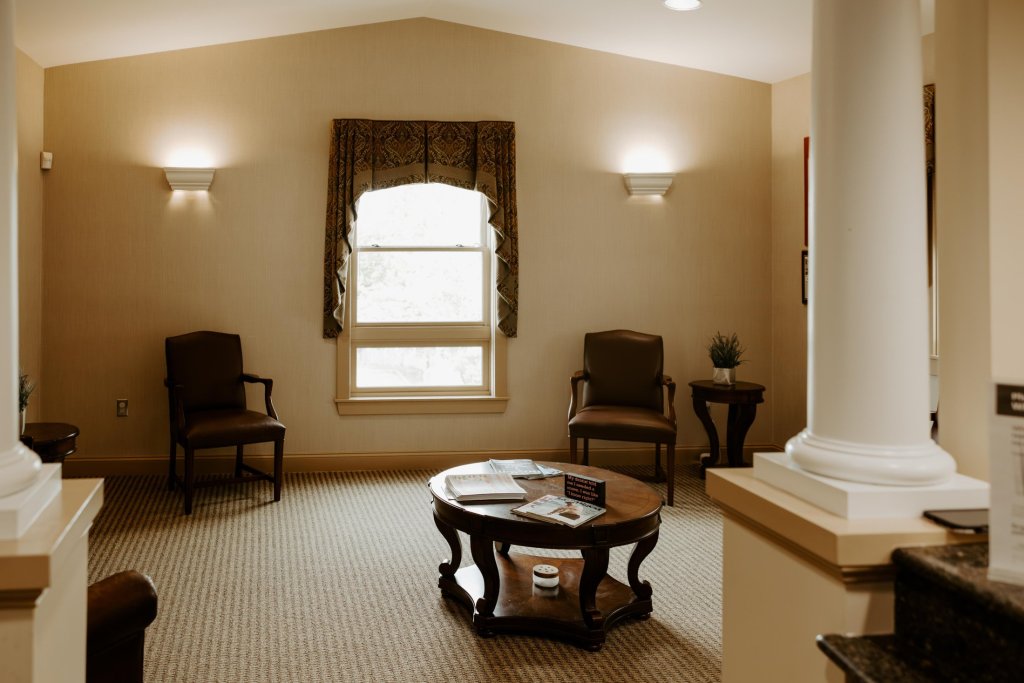 Comfortable dental office waiting room with seating and welcoming décor